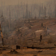 A forest is smoldering after the Oak Fire near Mariposa, California, on July 24, 2022.